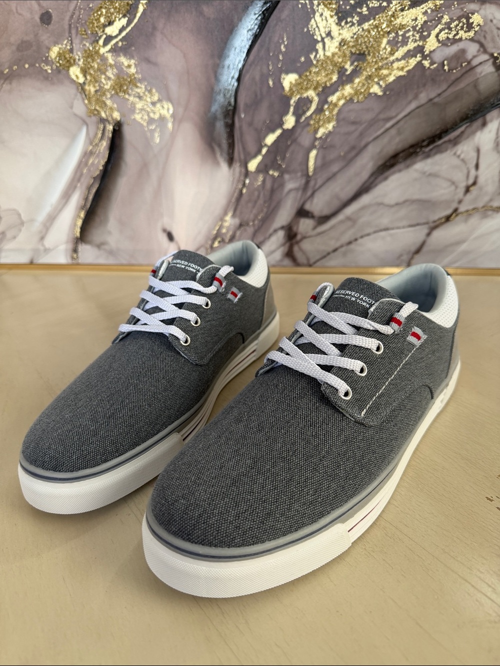 Reserved Grey Canvas Sneakers with White Soles and Red Trim